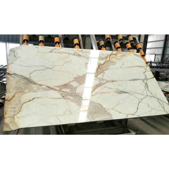 calacatta gold marble fireplace